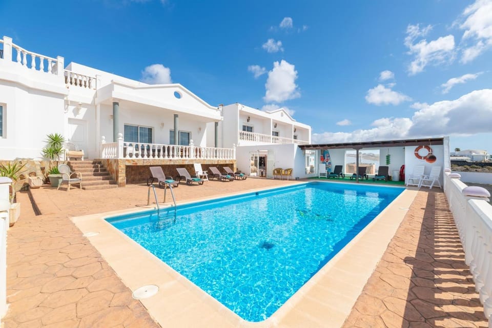 Property building, Living room, Swimming pool
