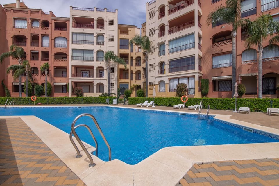 Property building, Living room, Swimming pool