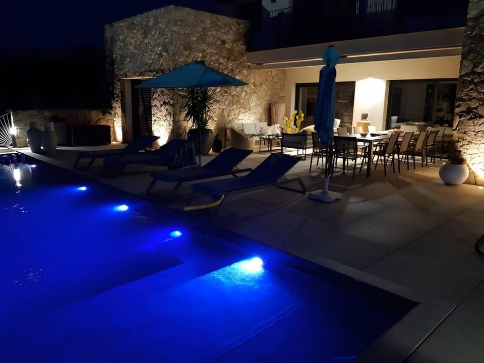 Property building, Living room, Swimming pool