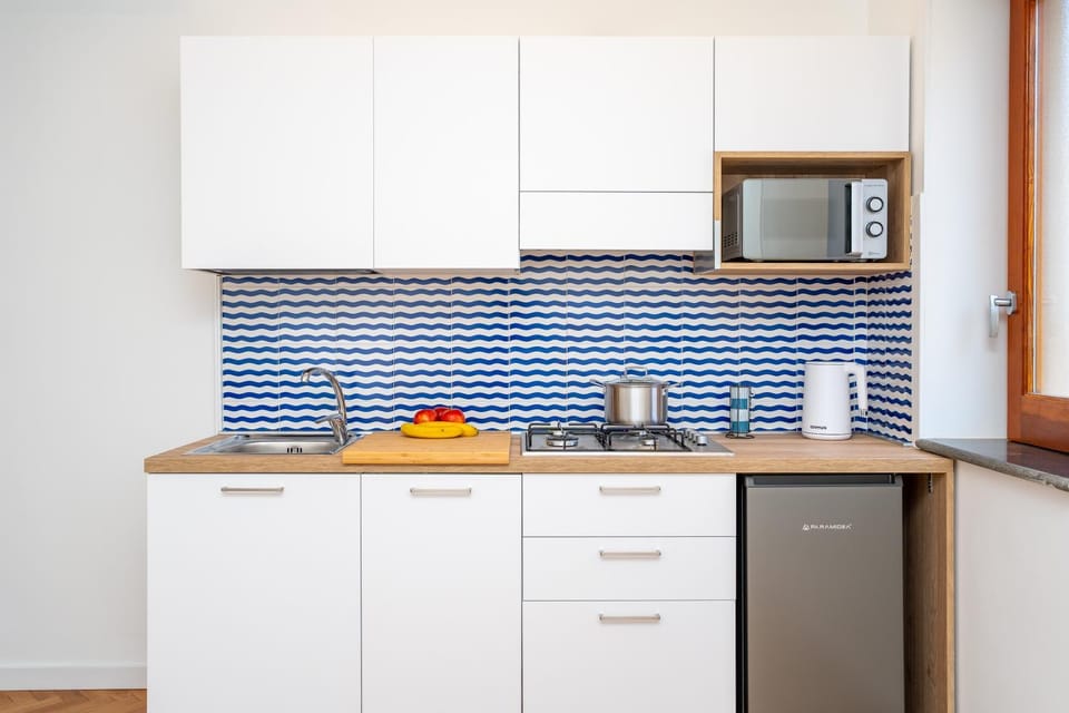 Kitchen or kitchenette, stove