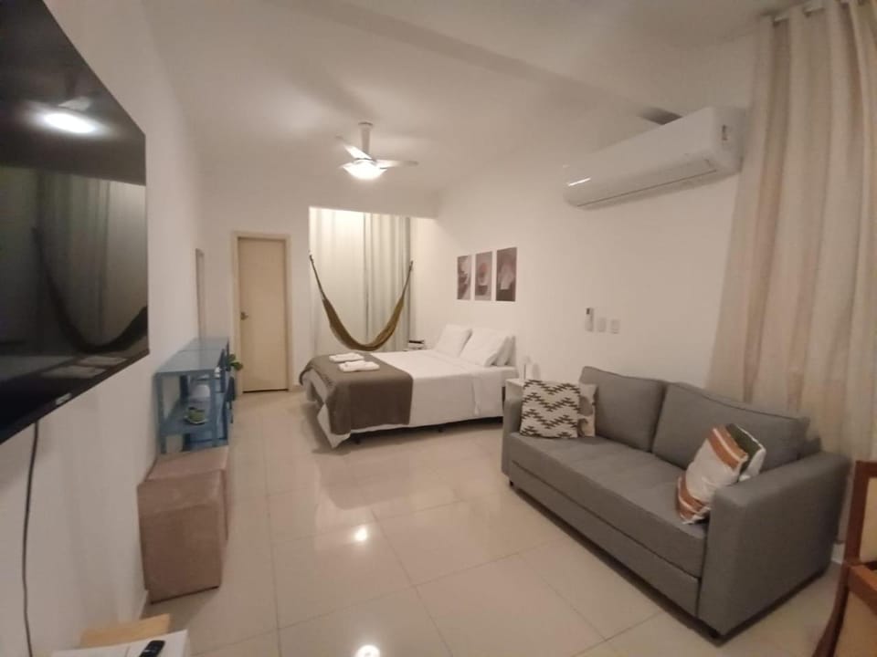 Communal lounge/ TV room, Bed, TV and multimedia, Living room, Photo of the whole room, Seating area, Evening entertainment, Bedroom, air conditioner