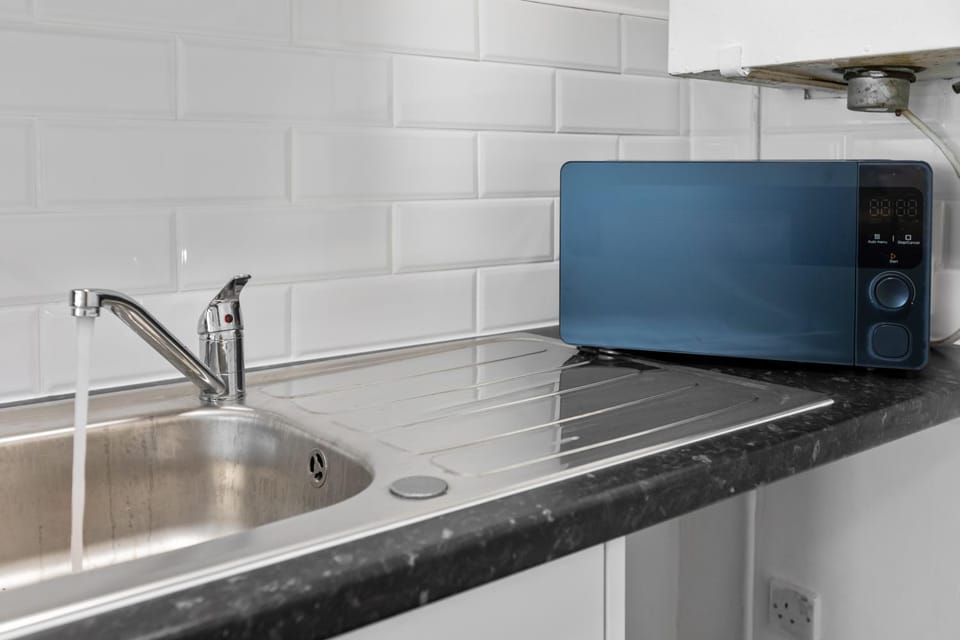 Kitchen or kitchenette, microwave