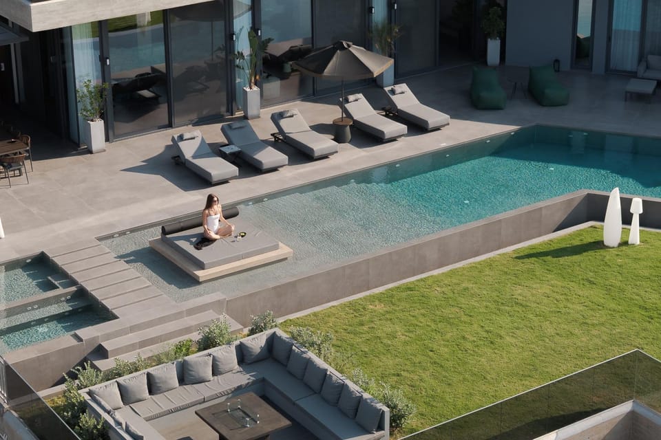 Property building, People, Seating area, Swimming pool, sunbed