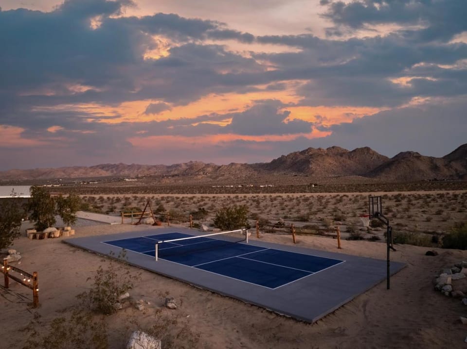 Three-Home Desert Escape with Pool, Outdoor Theatre & Pickleball House in Joshua Tree