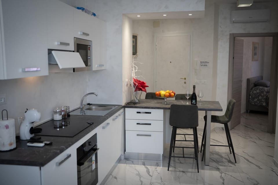Kitchen or kitchenette, Living room, Seating area, stove