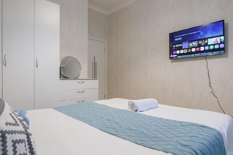 Двухкомнатная кв на Триумфальной арке Apartment in Kazakhstan
