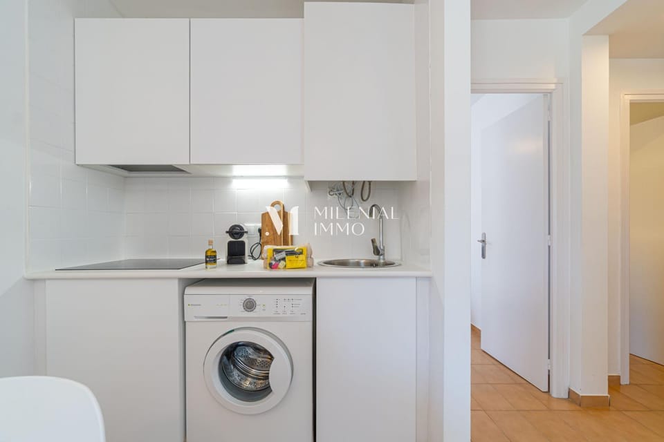 Kitchen or kitchenette, washing machine