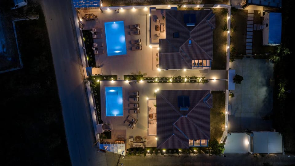 Property building, Night, Neighbourhood, Bird's eye view, Pool view, Street view, Swimming pool, Location, Parking