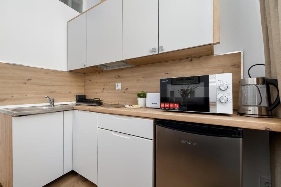 Kitchen or kitchenette, stove, toaster