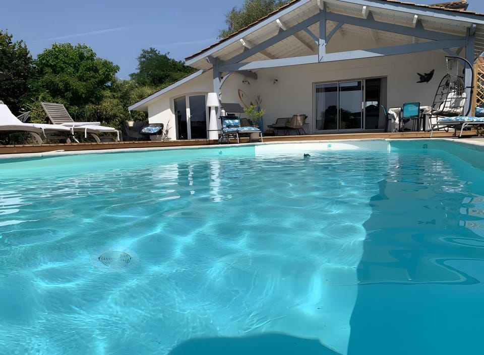 Property building, Living room, Swimming pool