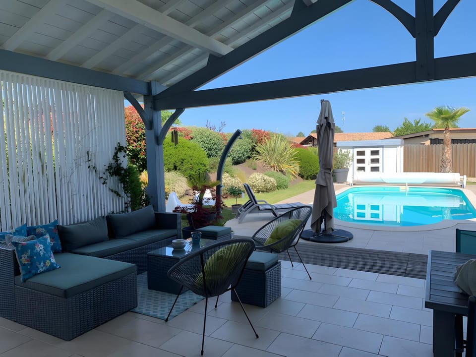 Property building, Living room, Swimming pool