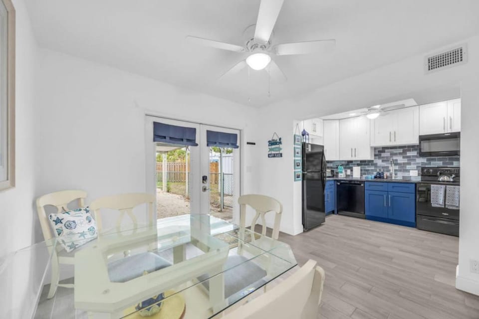 Riverfront Bungalow with Dock Access Near Eau Gallie Arts District and Beach Apartment in Melbourne