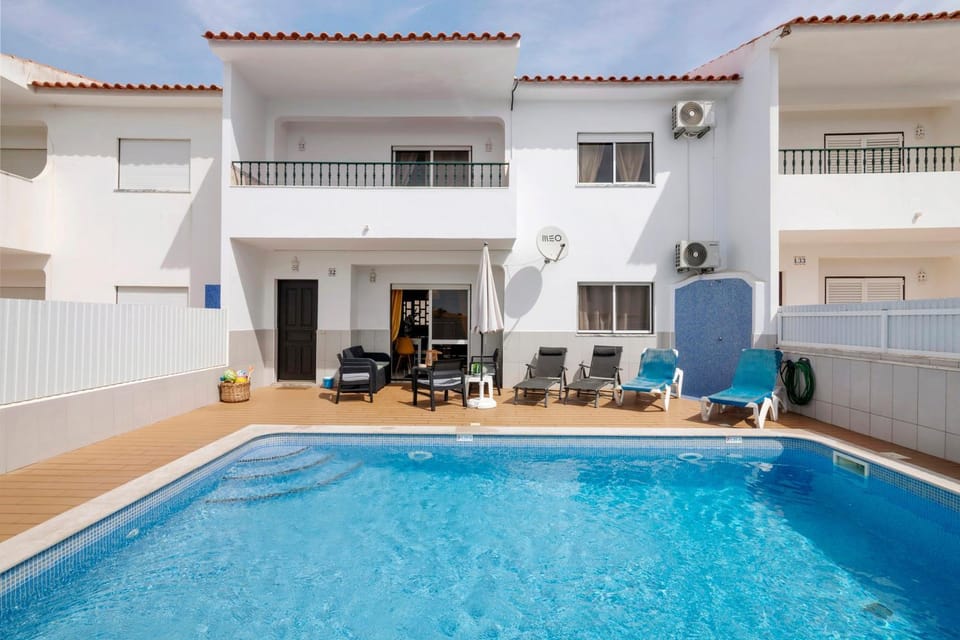 Property building, Living room, Swimming pool