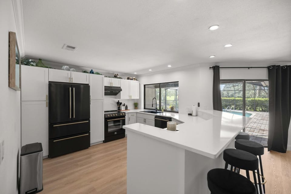 Kitchen or kitchenette, dishwasher, oven, stove