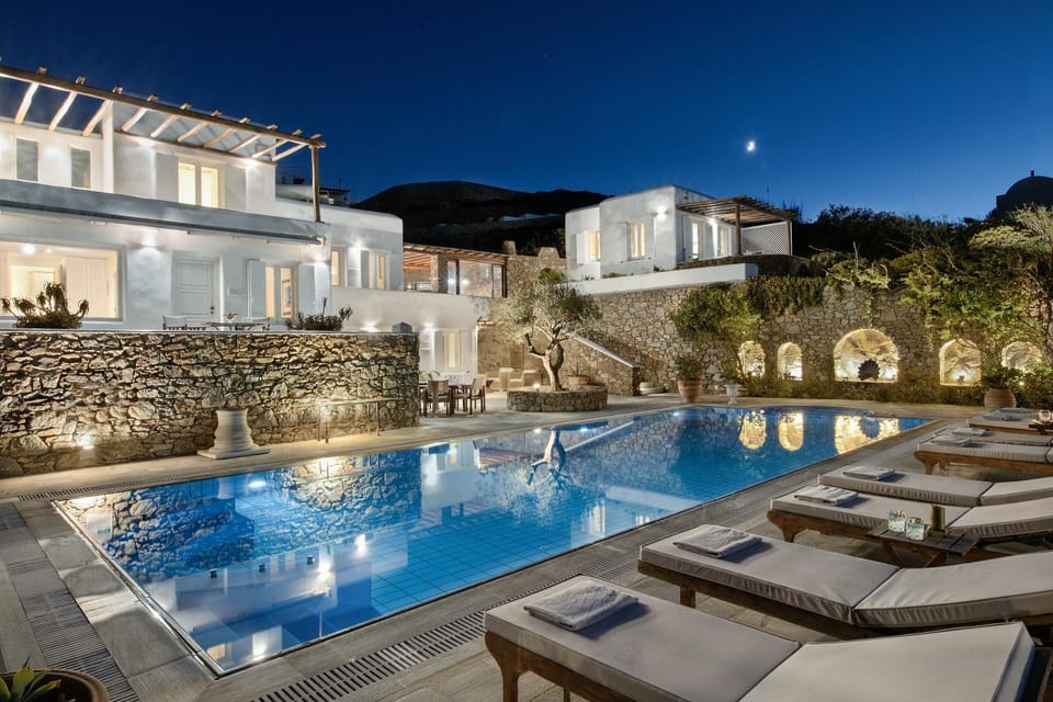 Property building, Night, Natural landscape, Pool view, Swimming pool, sunbed