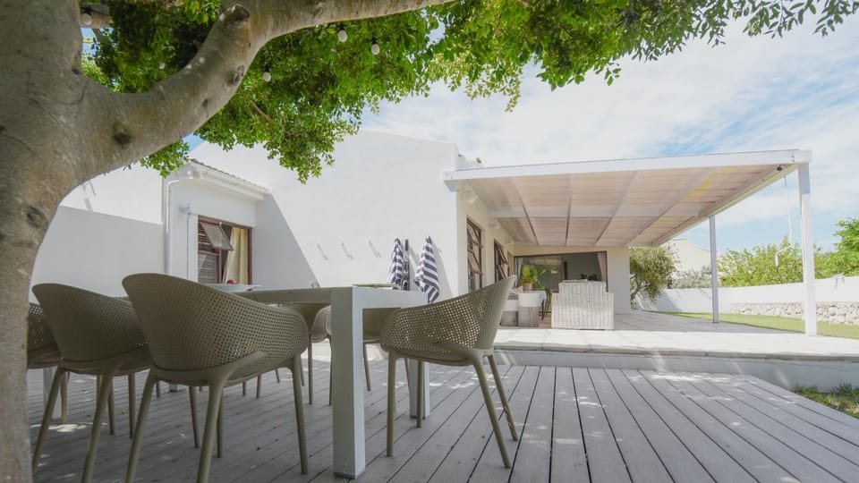 Property building, Patio, View (from property/room), Seating area, Dining area, Beach, Sea view