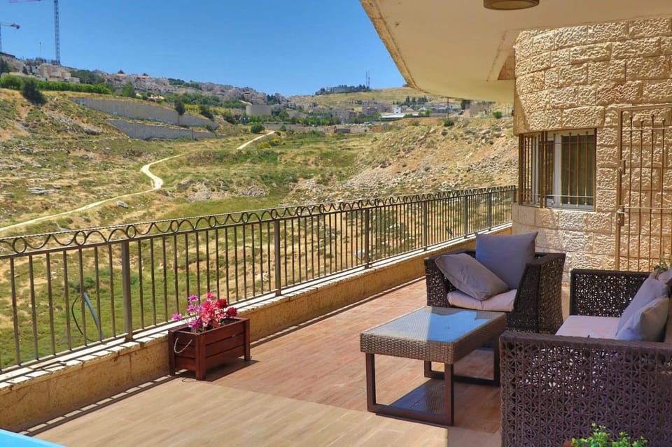 Property building, Patio, Spring, Day, Natural landscape, View (from property/room), Balcony/Terrace, Seating area, Mountain view