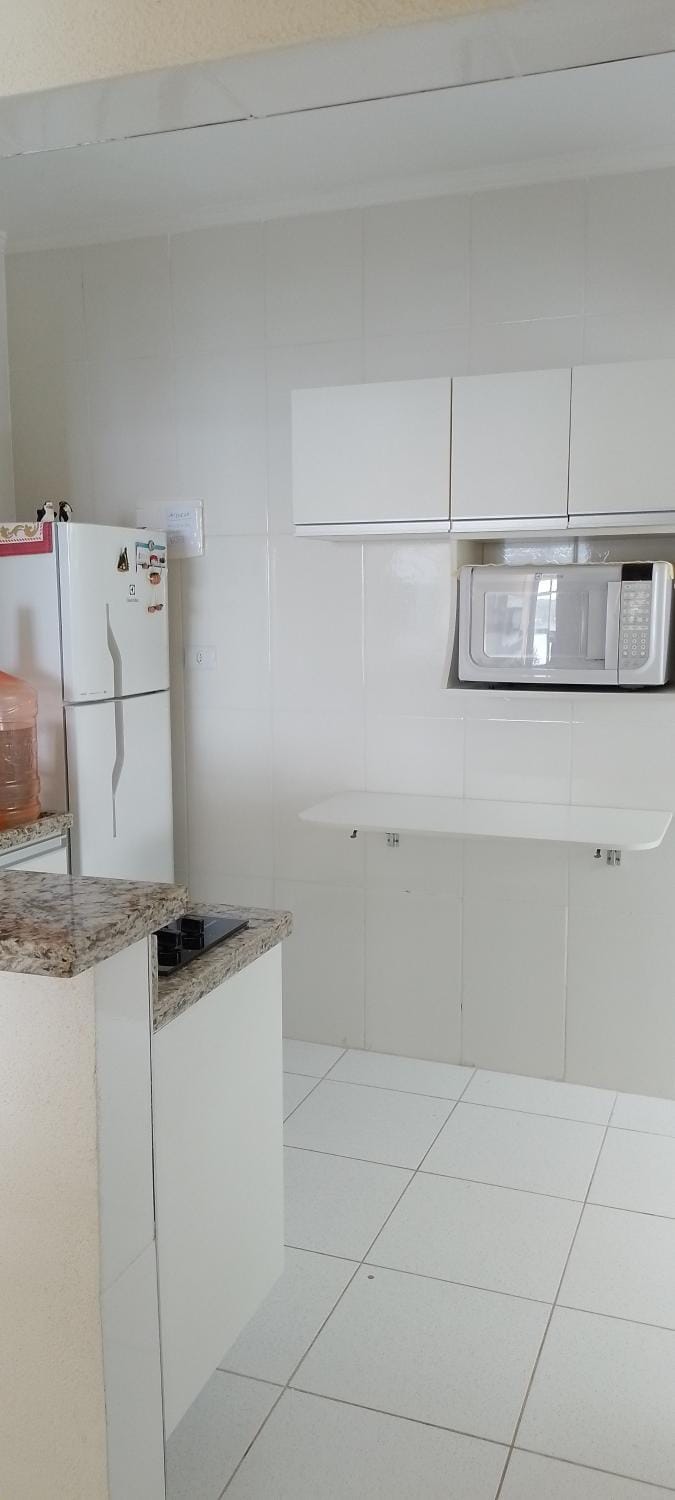 Pe na areia Vista de cinema São Vicente SP 1 mi da praia Apartment in Santos