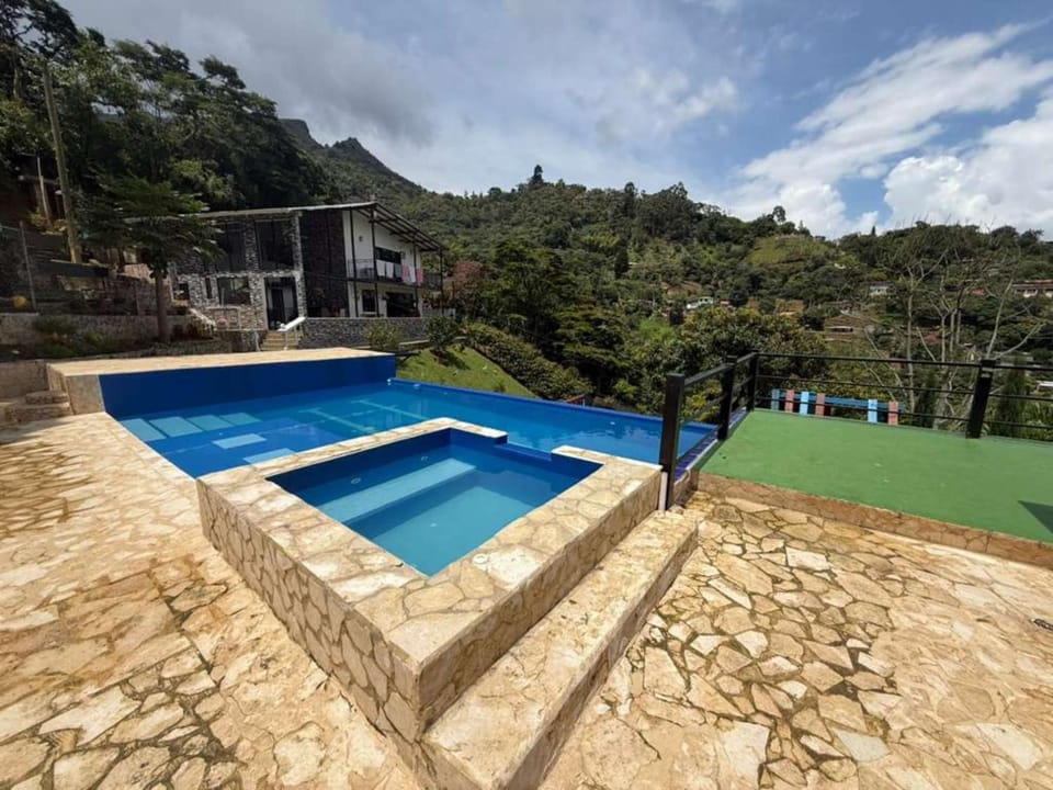 Property building, Natural landscape, Mountain view, Pool view
