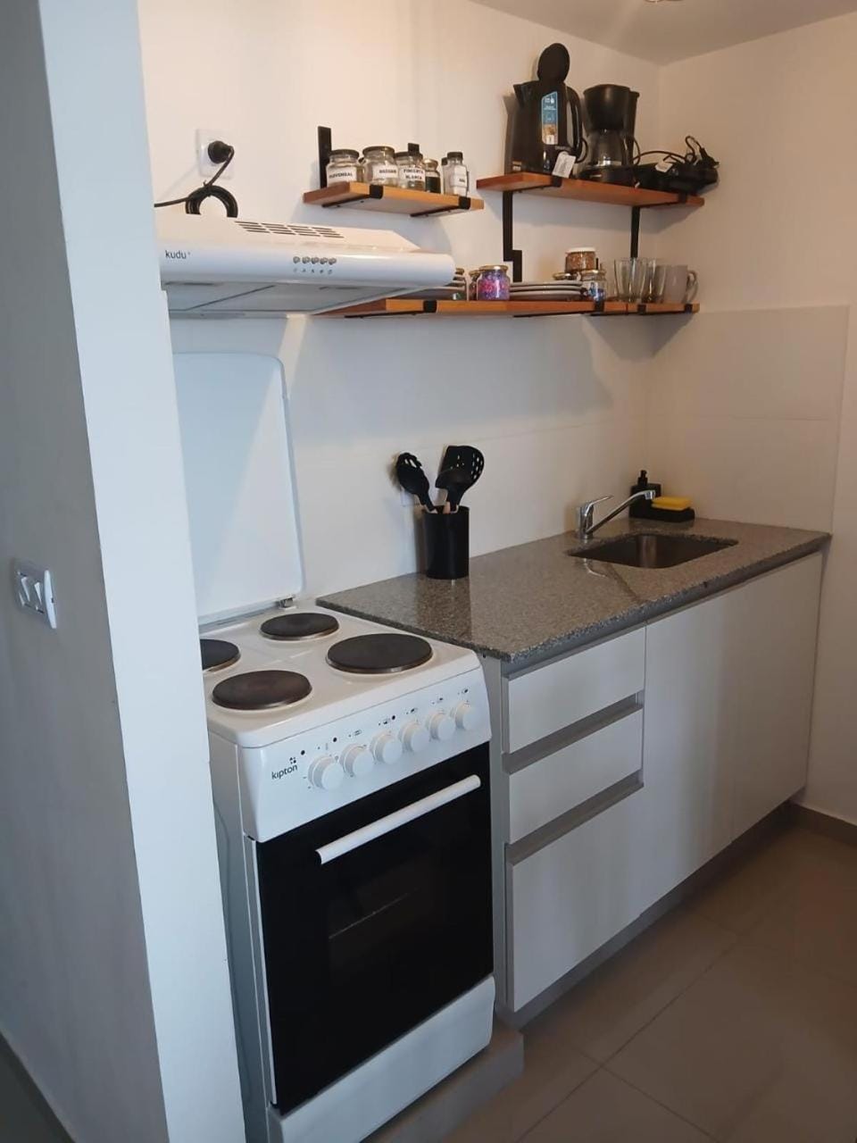 Kitchen or kitchenette, stove