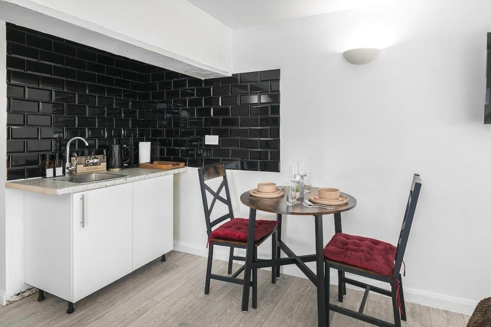 Warehouse Conversion Studio by Station Apartment in London Borough of Hackney