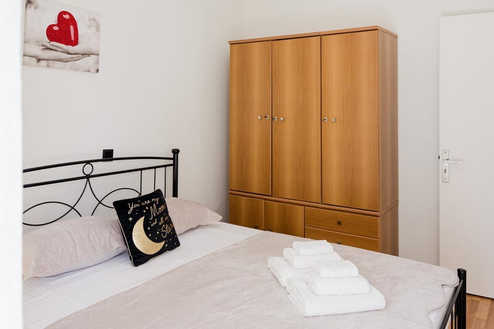 Bed, wardrobe