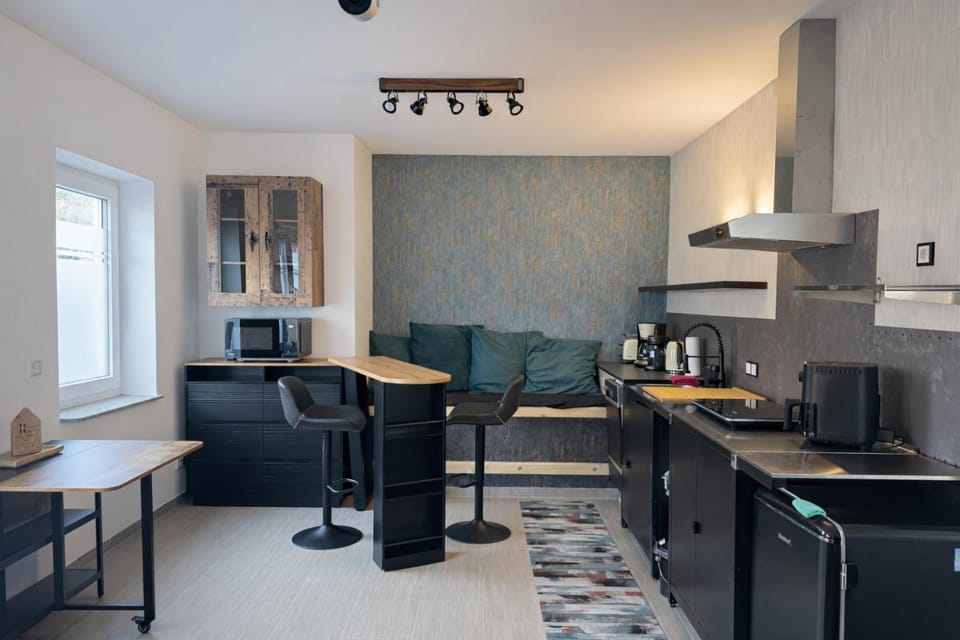 Coffee/tea facilities, Kitchen or kitchenette, Living room, Dining area, Time of day, dishwasher, microwave, stove, toaster, toaster, kitchen