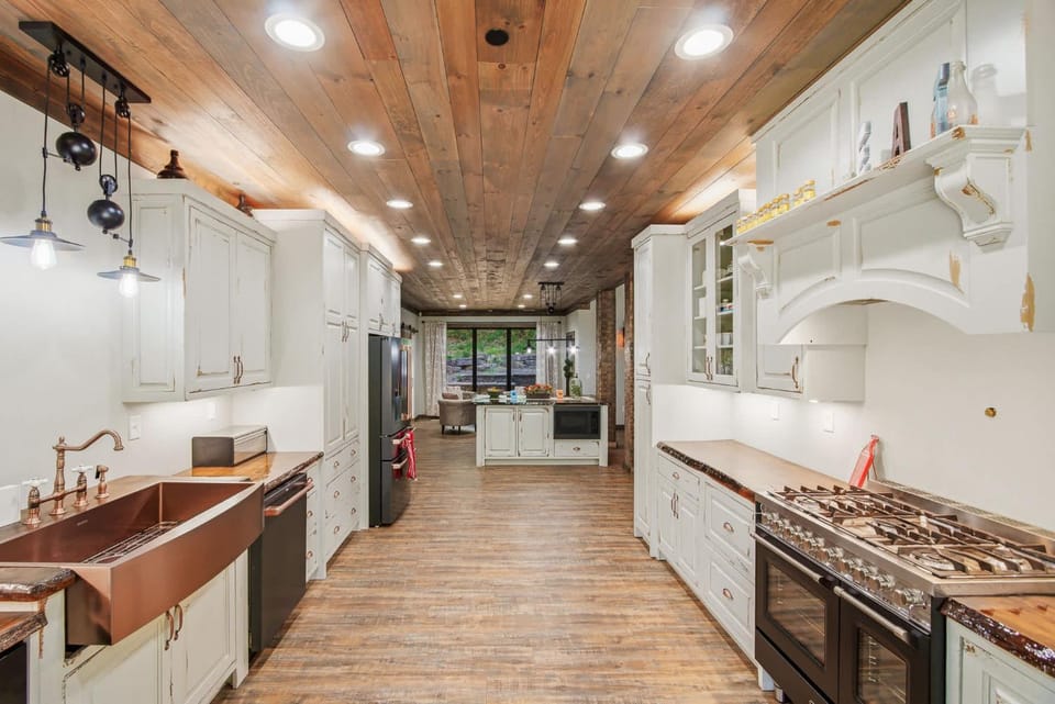 Luxe Riverfront Cabin Walk to Parkway Hot Tub Cabin in Pigeon Forge