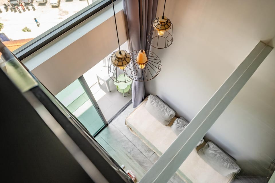 Floor-to-Ceiling Mountain View Loft Naiharn Apartment in Rawai