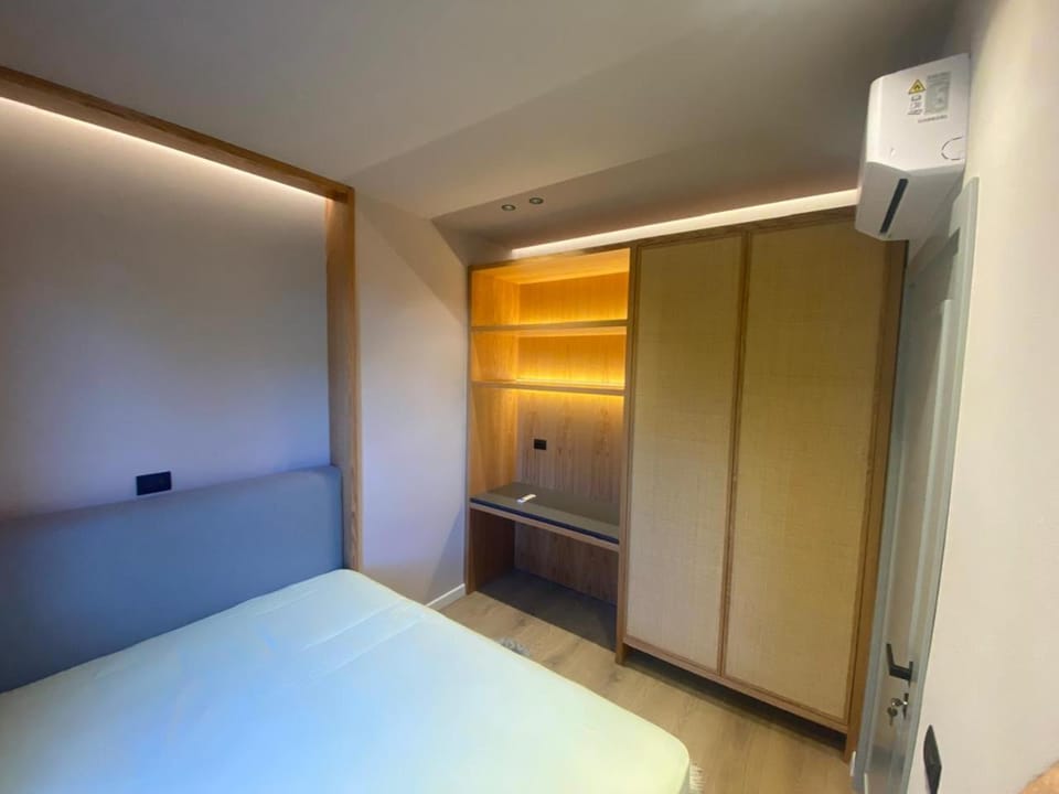 Bed, wardrobe