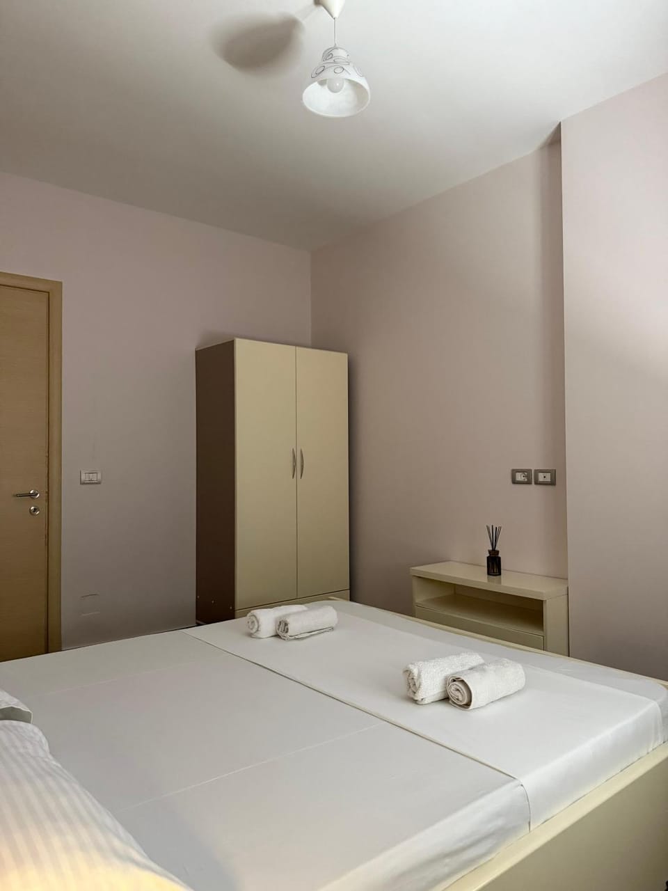 Bedroom, towels, wardrobe