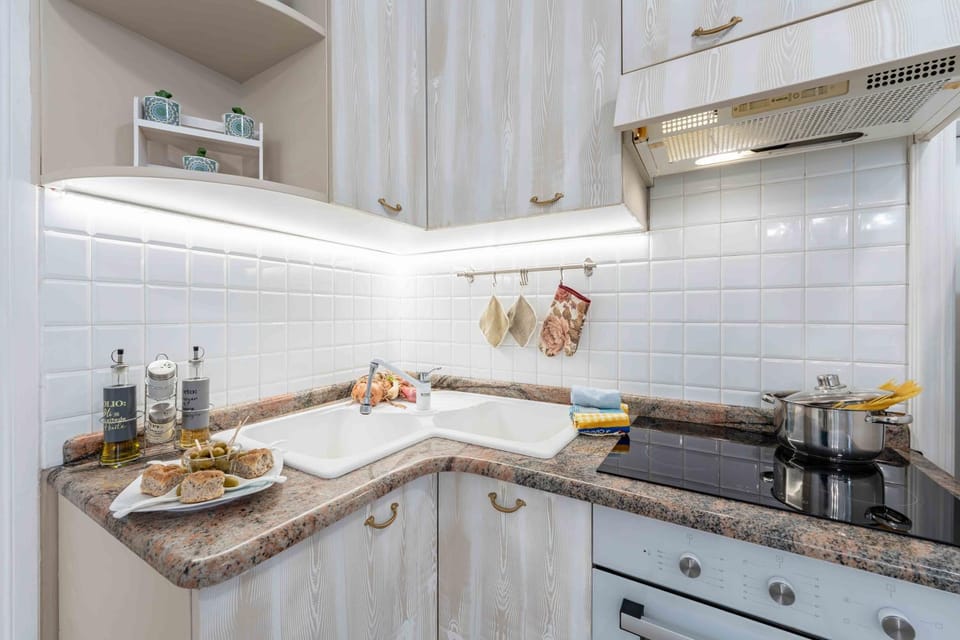 Kitchen or kitchenette, stove