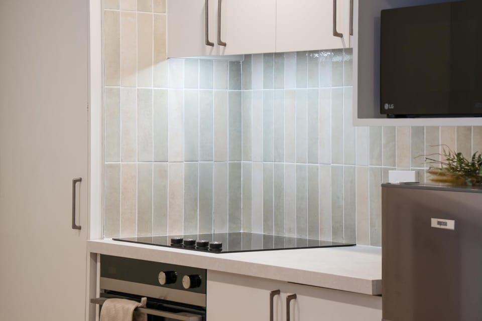 Kitchen or kitchenette, oven, stove