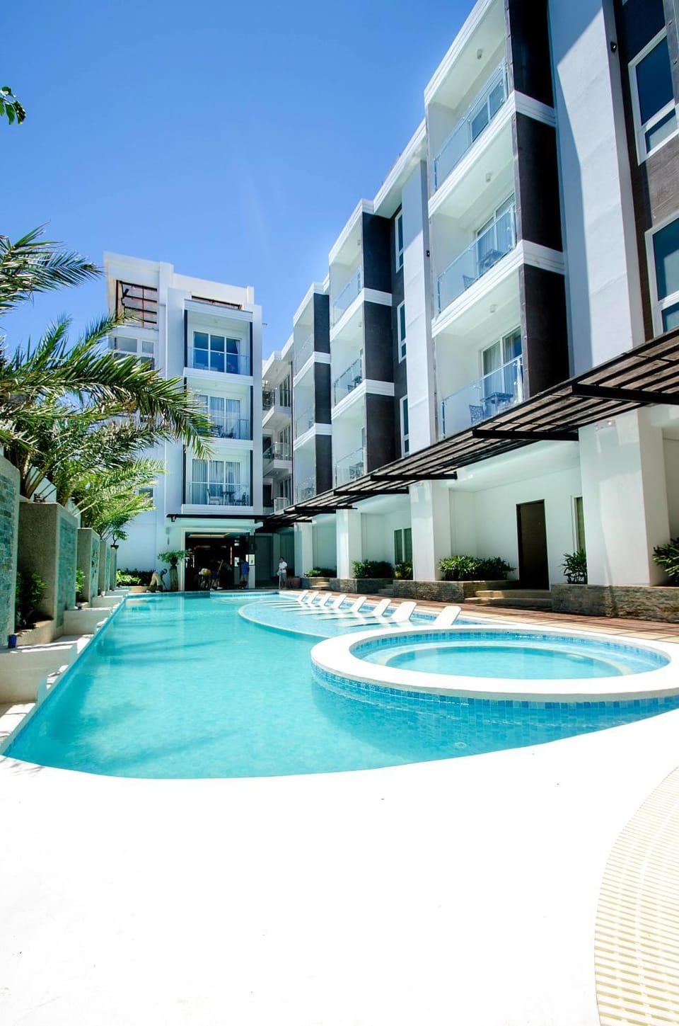 Property building, Facade/entrance, Day, Swimming pool