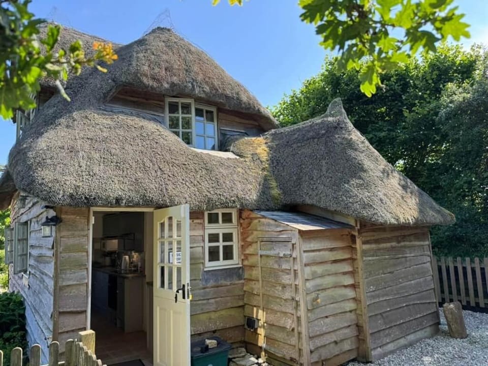 Music Room - traditional Purbeck Thatch Cottage House in Corfe Castle
