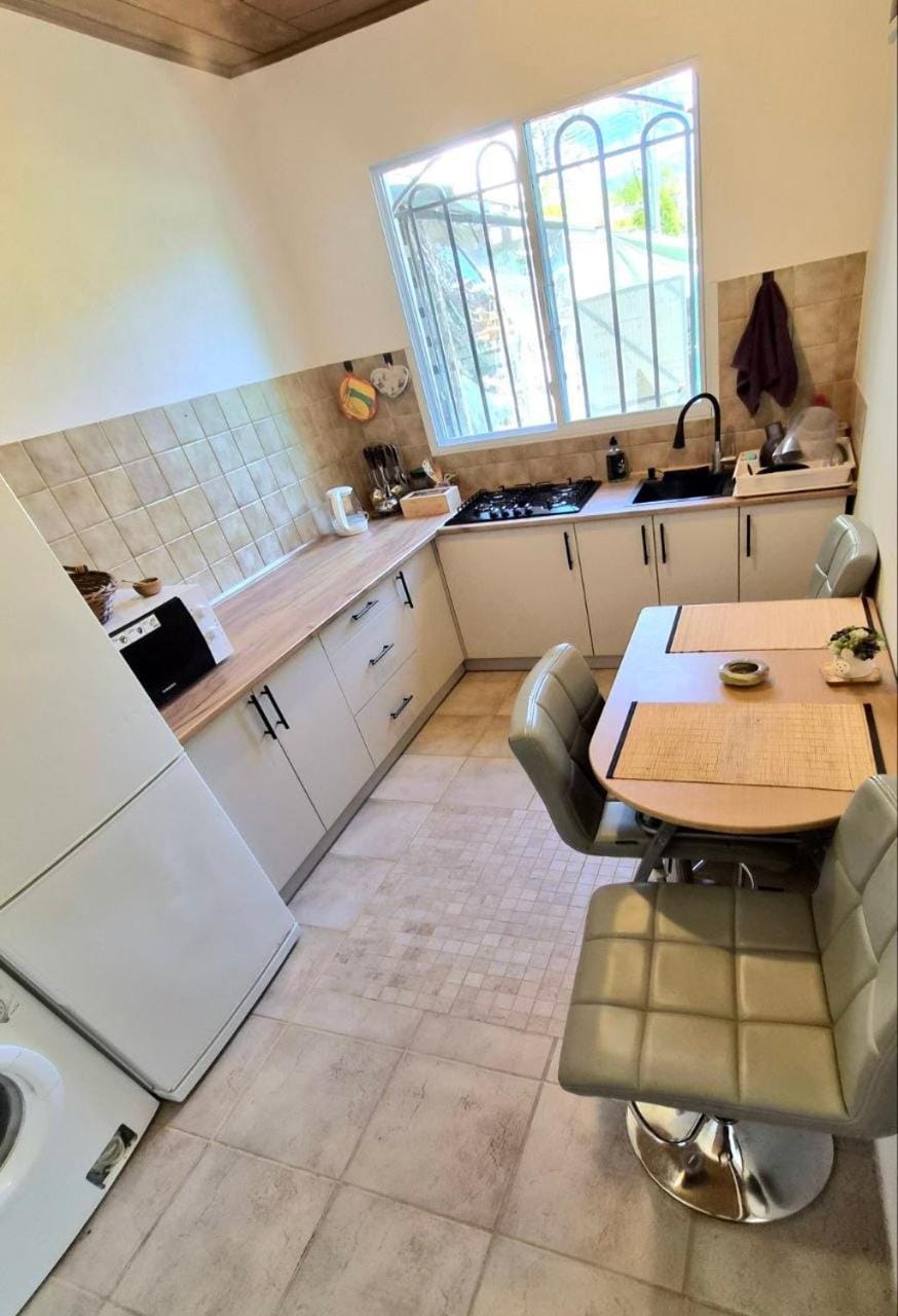 Kitchen or kitchenette, microwave, stove