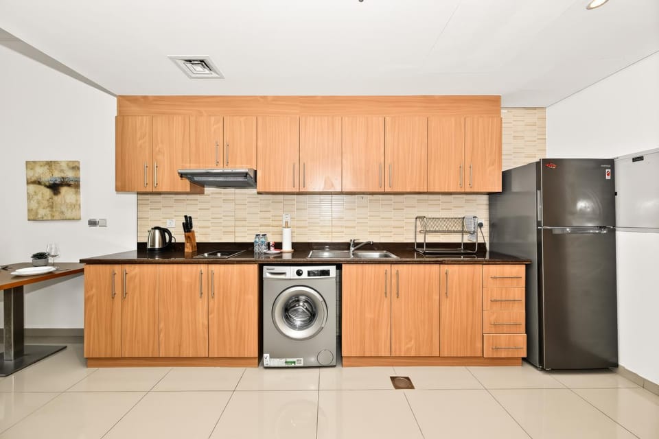 Kitchen or kitchenette, stove, washing machine, kitchen