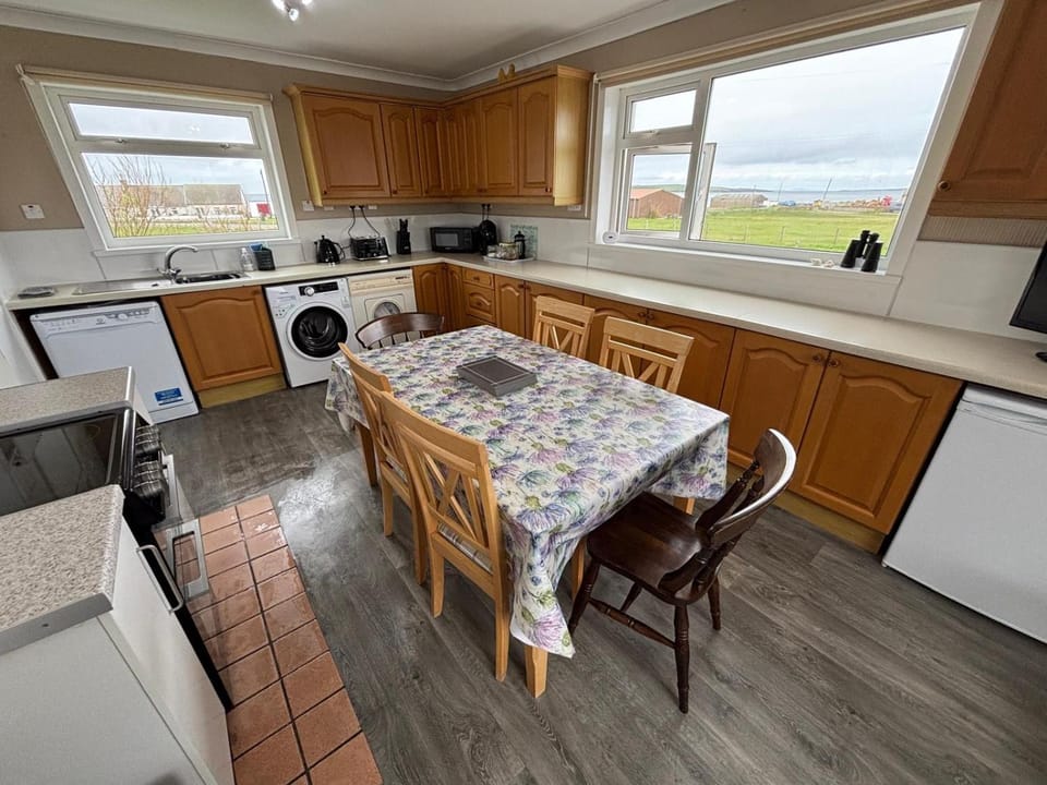 Kitchen or kitchenette, Seating area, Dining area, dishwasher, oven, pet friendly, stove, toaster, washing machine, dryer