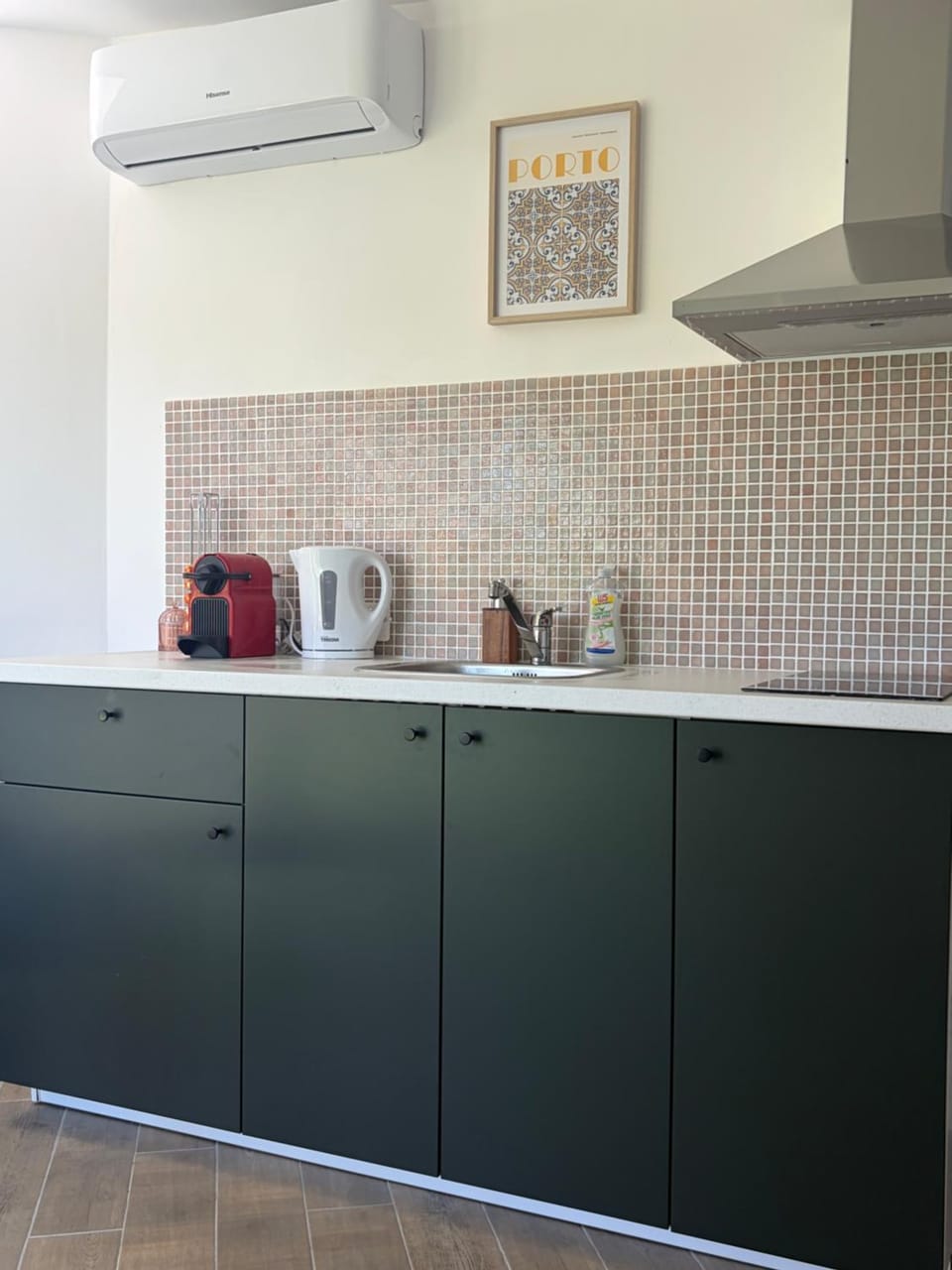 Kitchen or kitchenette, stove, air conditioner