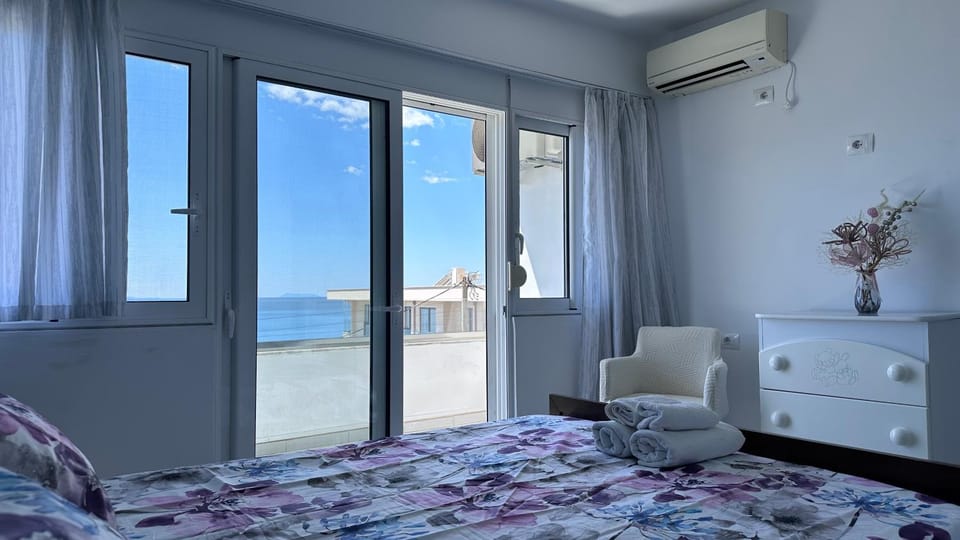 Bed, Natural landscape, Seating area, Bedroom, Sea view, internet, air conditioner