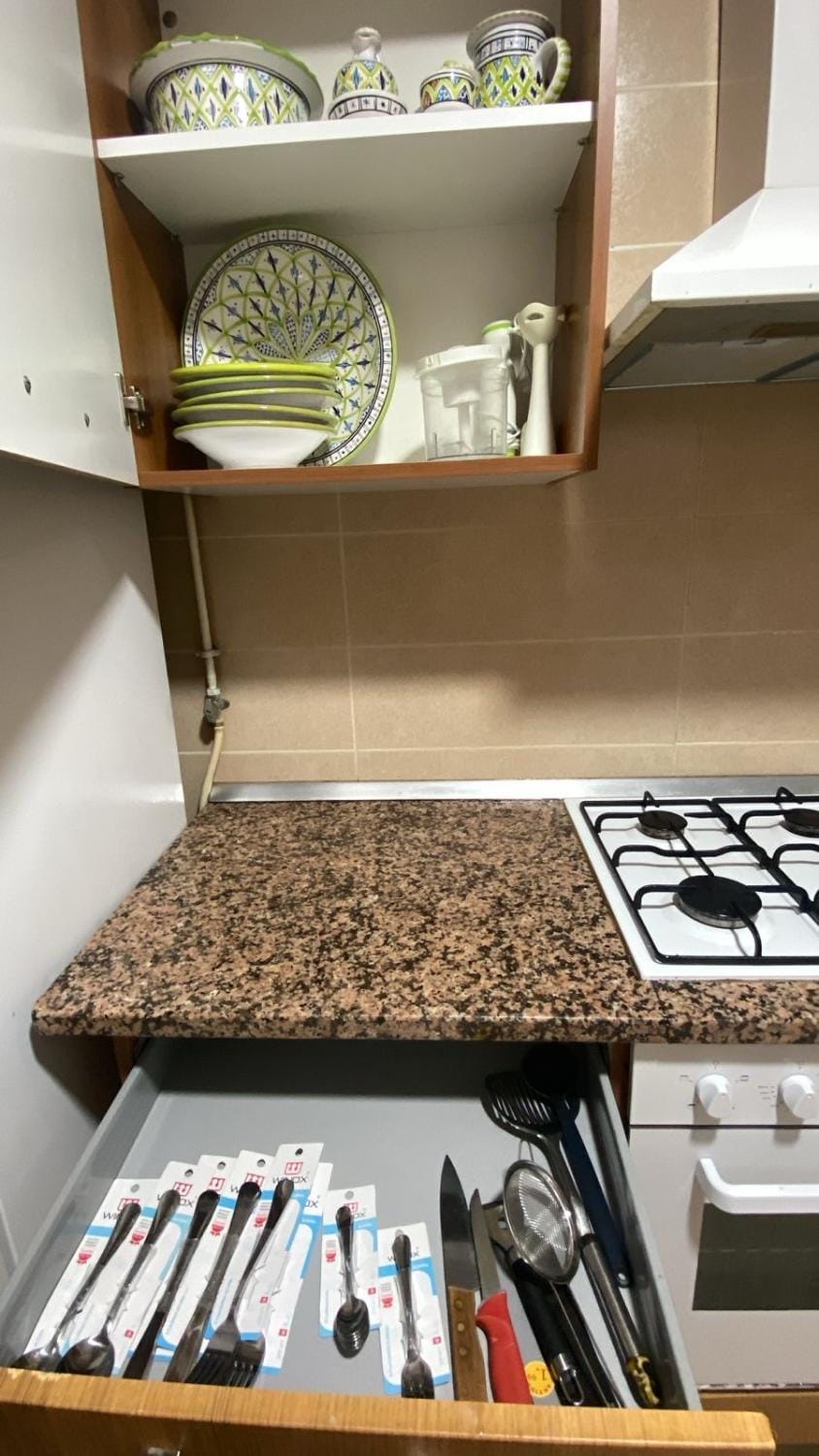 Kitchen or kitchenette, stove