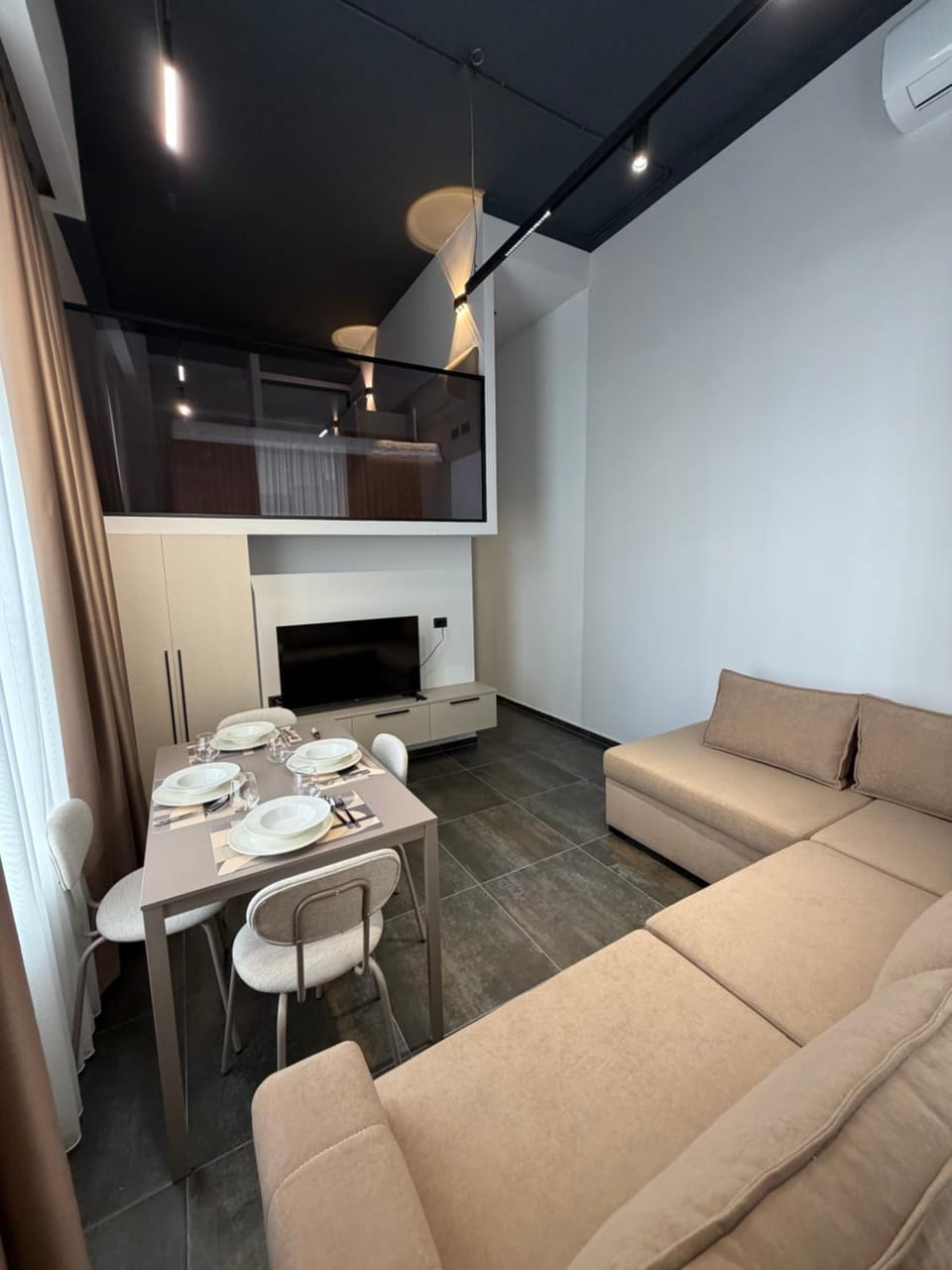 Kitchen or kitchenette, Living room, Seating area, Dining area