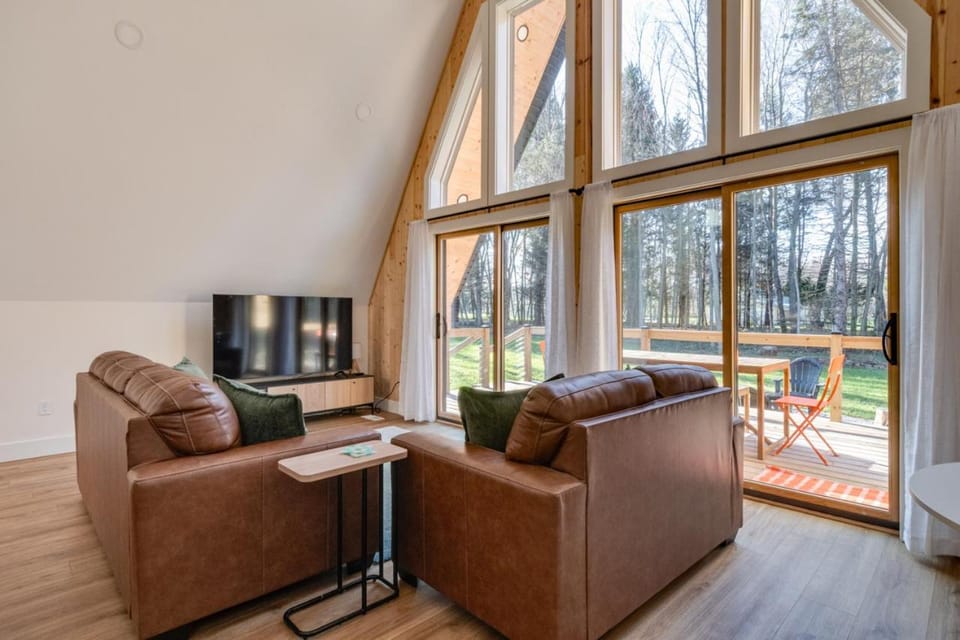 Secluded Architectural A-Frame w/ Soaring Windows & Fire Pit House in Michigan