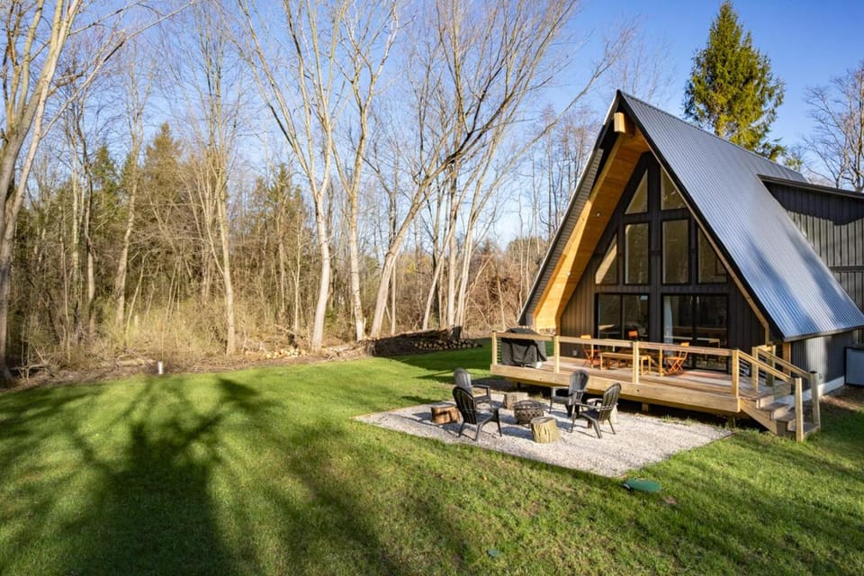 Secluded Architectural A-Frame w/ Soaring Windows & Fire Pit House in Michigan