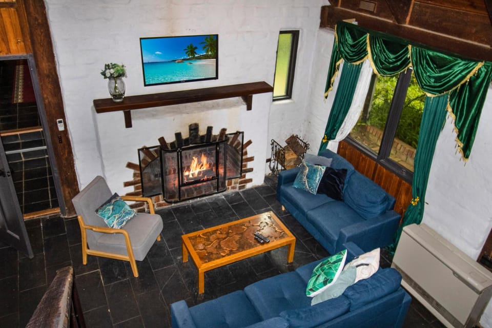 Natural landscape, View (from property/room), Living room, Seating area, fireplace