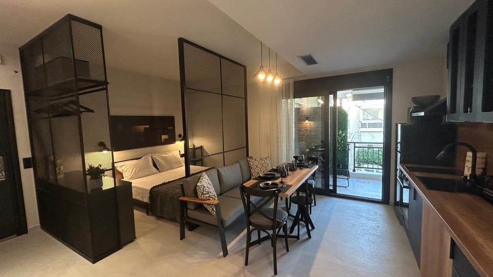Kitchen or kitchenette, Living room, Seating area, Dining area