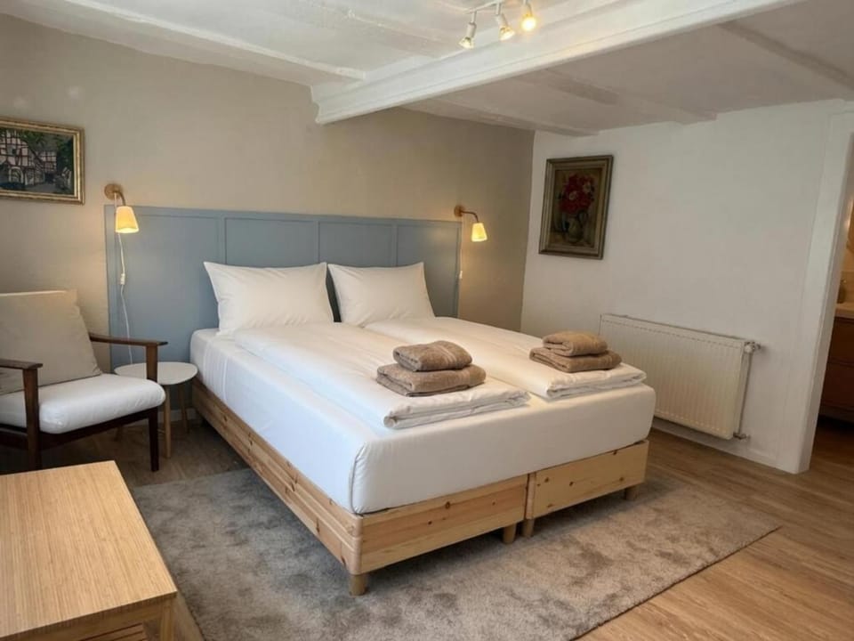Bed, Seating area, Bedroom, towels