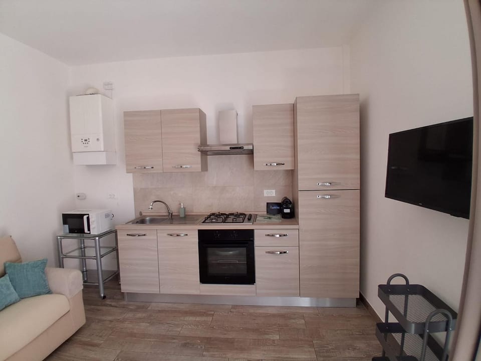 Kitchen or kitchenette, stove