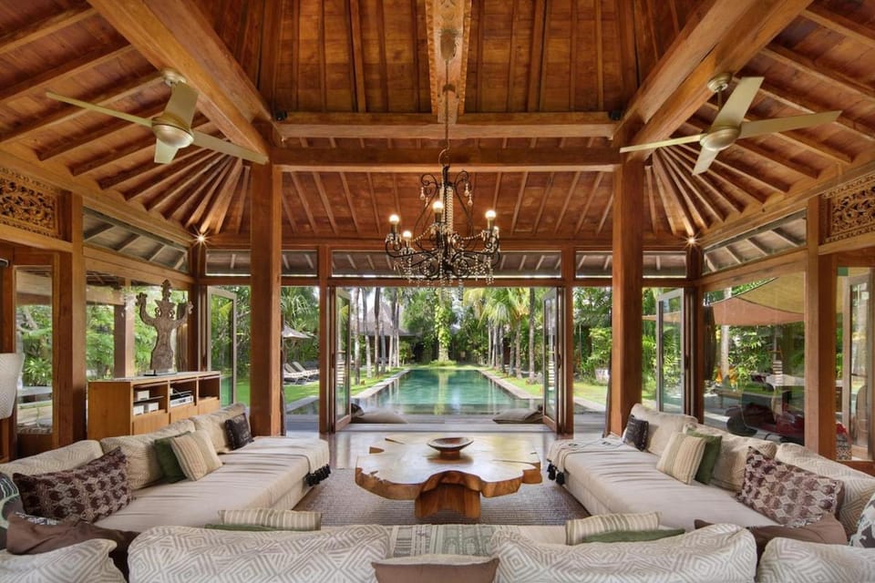 Living room, Seating area, Garden view, Pool view
