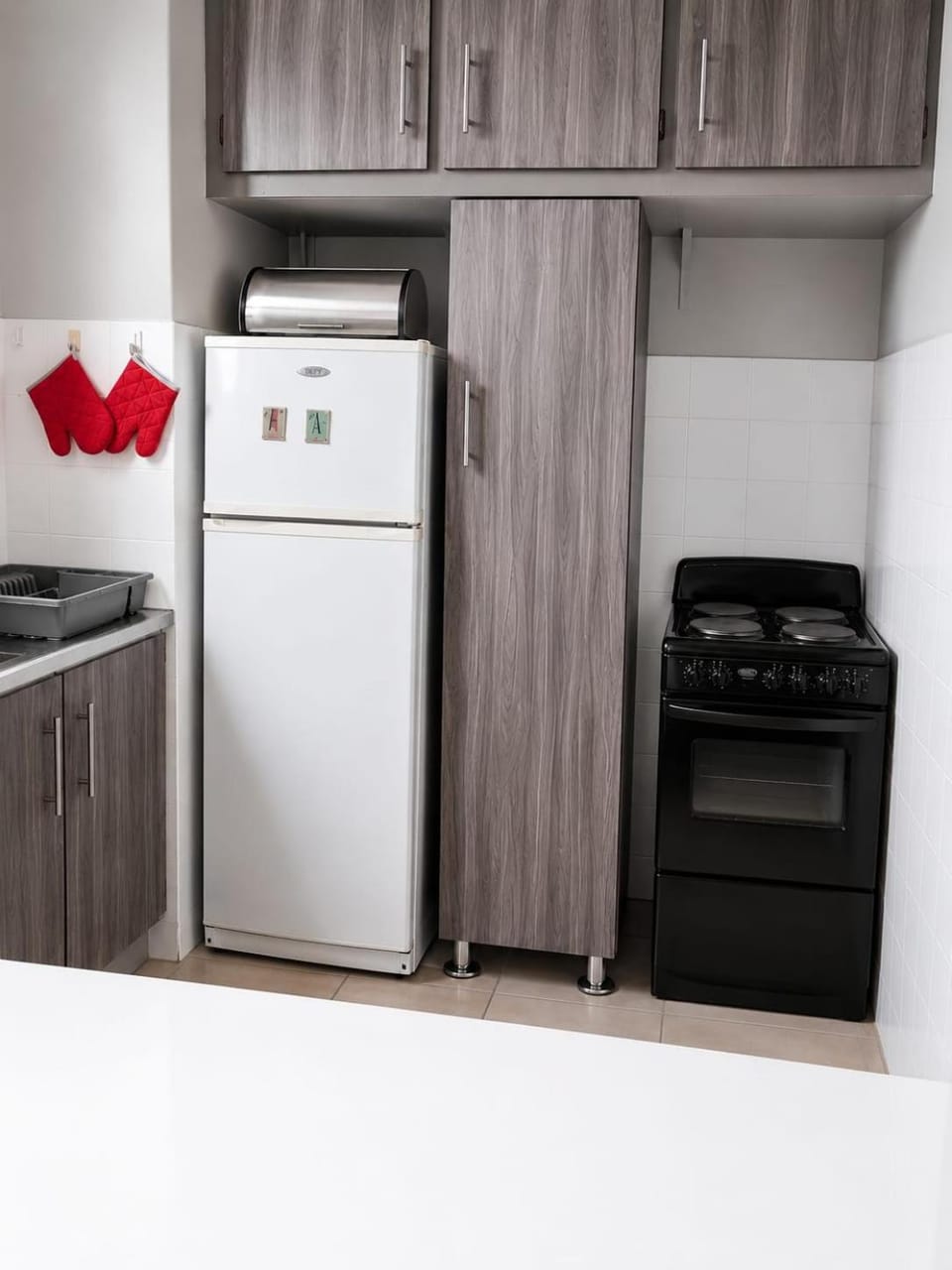 Kitchen or kitchenette, oven, stove